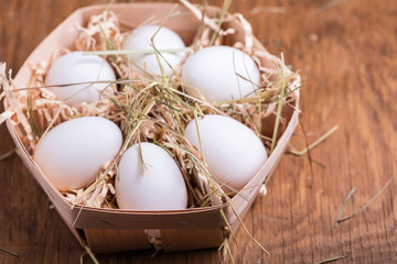chicken eggs in basket