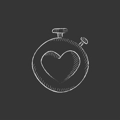 Stopwatch with heart sign. Drawn in chalk icon.
