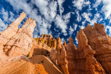 Bryce Canyon scenery, profiled on deep blue sky with clouds