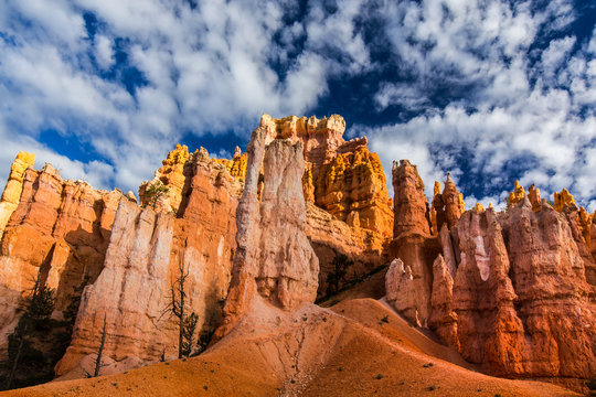 Bryce Canyon scenery, profiled on deep blue sky with clouds