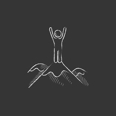 Man standing on top of mountain. Drawn in chalk icon.