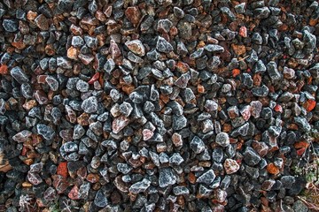 Little stones, concretions, calculus on earth. Close up. Stone, rocky background