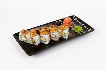 Image of tasty sushi set with apples and peanuts