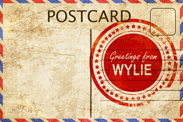 wylie stamp on a vintage, old postcard