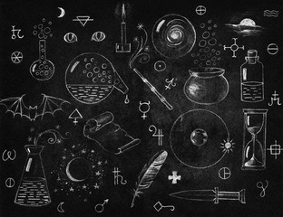 Alchemy symbols collection on chalkboard. Philosophy, spirituality, occultism, chemistry, science, alchemy and magic symbols.