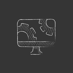 Computer monitor with gears. Drawn in chalk icon.