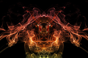 Colored abstract smoke like a daemon, isolated on black background.