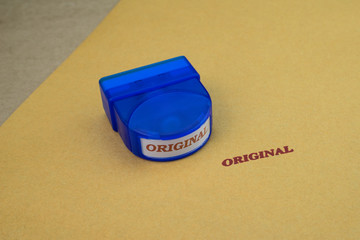 Stamp with original on recycle paper