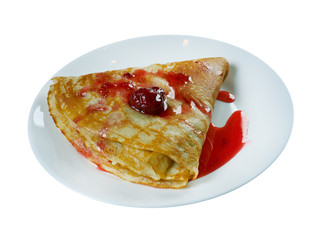 Pancakes with strawberry jam.