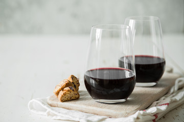 Red wine in glasses with cookies