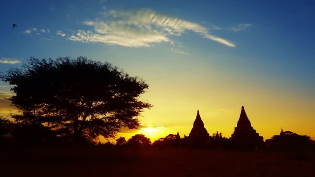 Silhouette of Temples and tree in Bagan at sunset, Myanmar (Burma), timelapse 4k
