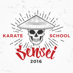 Japanese sensei skull Logo. Samurai master insignia design. Vintage ninja mascot badge. Martial art Team t-shirt illustration concept on grunge background