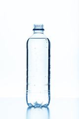 close up of a water bottle on white background