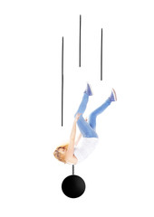 Woman falling with metal ball around her neck