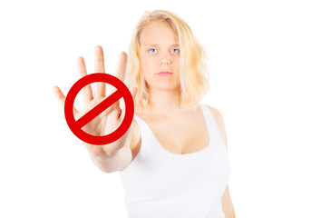 Woman signing STOP with her hand