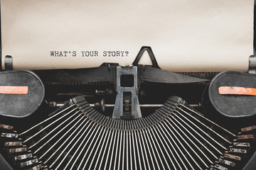 What's Your Story? question printed on an old typewriter.