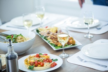 Food and wine served on table 