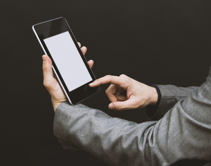Man in suit with a pc tablet
