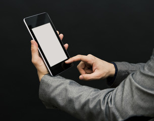 Man in suit with a pc tablet