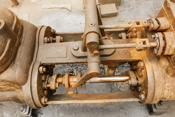 Fototapeta na wymiar Industrial pipe valves Control system in the old steel mill