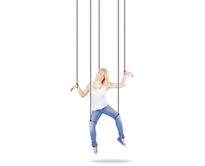 Girl being held by strings as a marionette