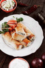 Phyllo pastry rolls with cheese and spinach