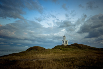 Fototapeta na wymiar lighthouse in sunset