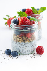 Breakfast in a jar, chia with berries and oat flakes 