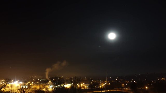 Time Lapse Night City With A Moving Moon Until Dawn