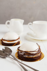 White mousse dessert with mirror glaze
