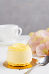 French mousse entremet with yellow chocolate velour