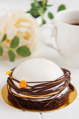 White mousse dessert with mirror glaze