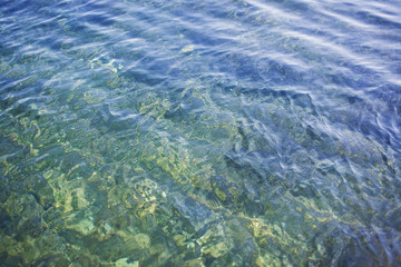 Fototapeta premium Sea water with waves. Abstract background