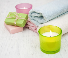 Fototapeta na wymiar Candle, towel and handmade soap