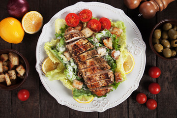 Grilled chicken steak with caesar salad