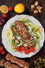 Grilled chicken steak with caesar salad