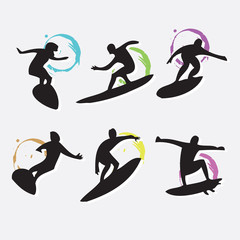 Obraz premium Silhouette of surfers