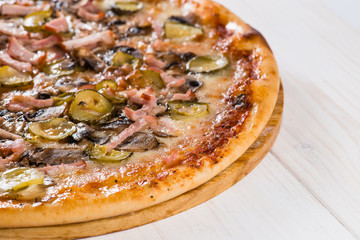 tasty pizza and text space on a white wooden background, mocup