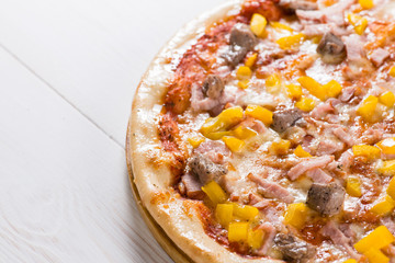 tasty pizza and text space on a white wooden background, mocup