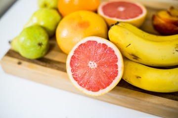 Close-up of fruits on chopping board