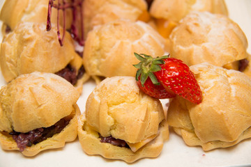 Eclair on ceramic plate