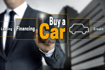buy a car touchscreen is operated by businessman