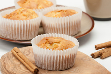 Homemade Apple Cinnamon Muffins On Olive Board.