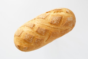 French baguette on a white background with space for text. product of flour. Bread long form. flat location a food on a white background. view from above