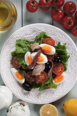 Nicoise salad with tuna, anchovy, eggs and olives