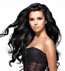 Beautiful brunette woman with long black  hair © Valua Vitaly