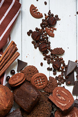 Many different chocolates and cookies