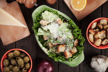 Caesar salad with lettuce, croutons and parmesan cheese