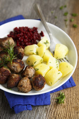 Swedish meatballs with potatoes and berries