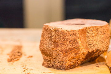 Close up of chocolate block on cutting board